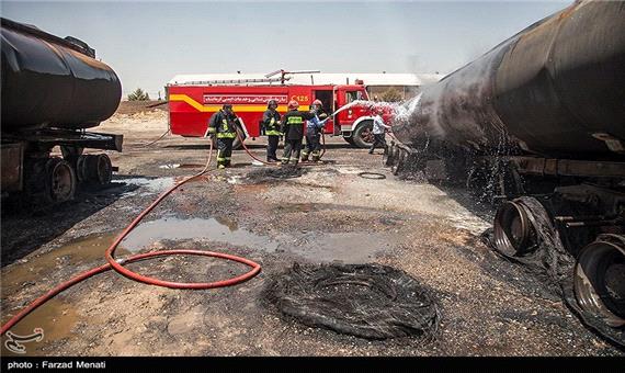 میزان خسارات حادثه آتش‌سوزی خودروهای سنگین کرمانشاه همچنان نامشخص است
